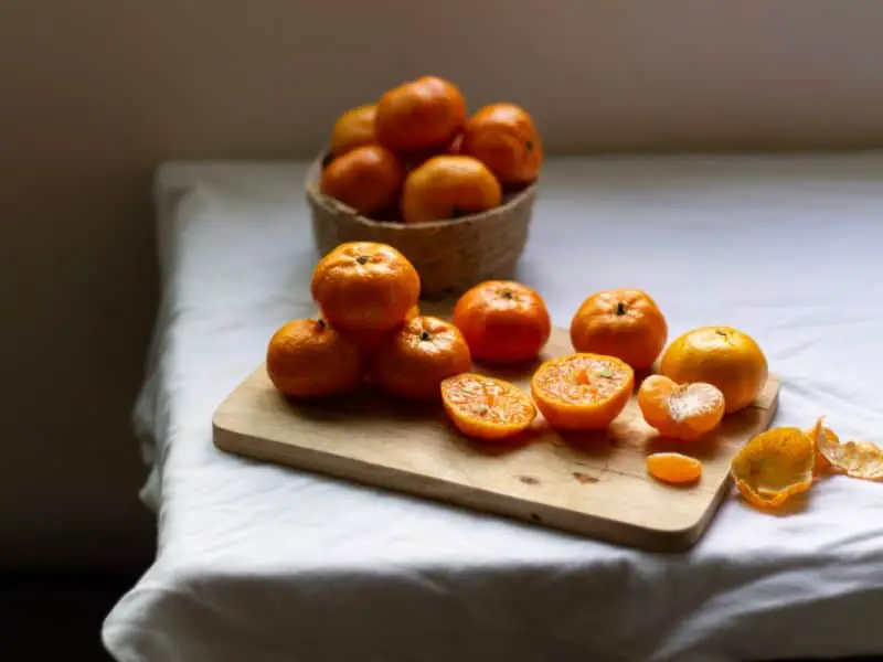 Photo of cut tangerine by a window