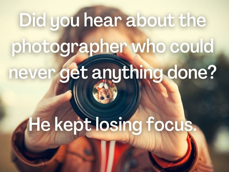 Photo of a person holding a camera lens with a photography pun