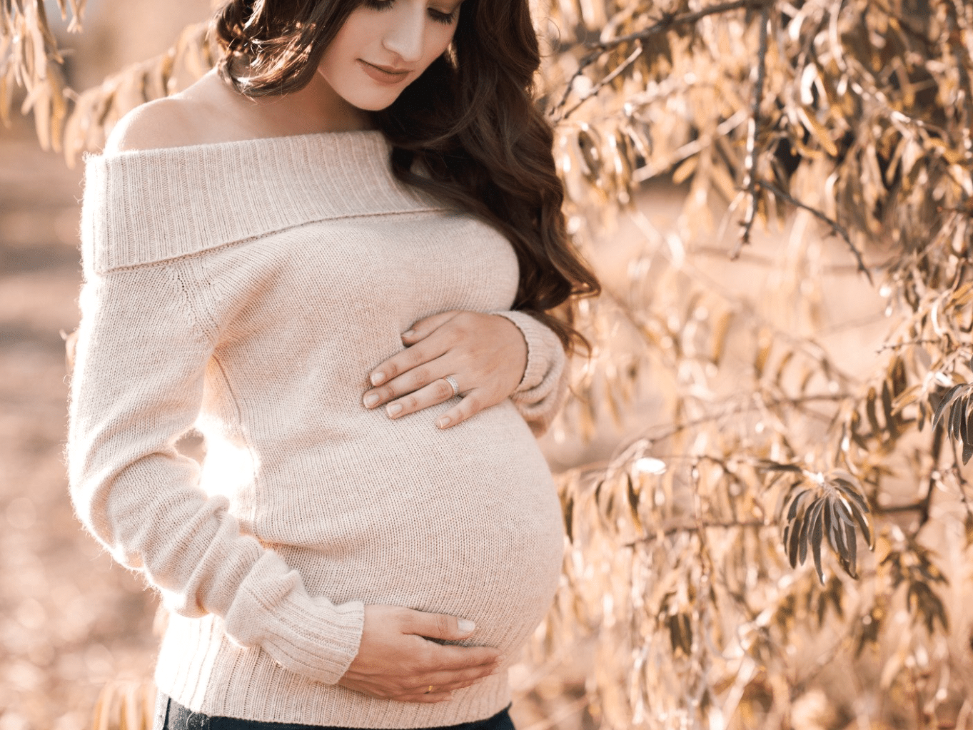 Woman doing a maternity photo shoot