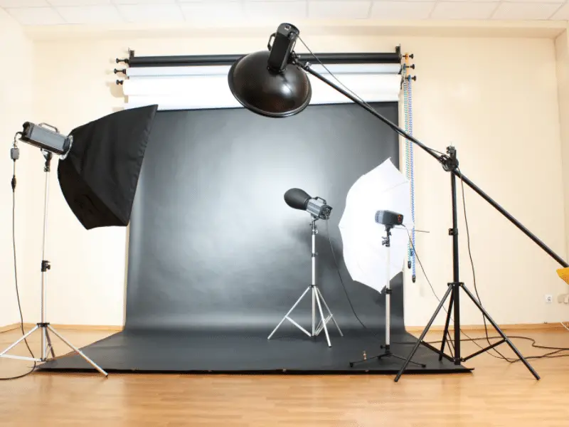 photo studio with portrait umbrella and other lighting gear for portraits